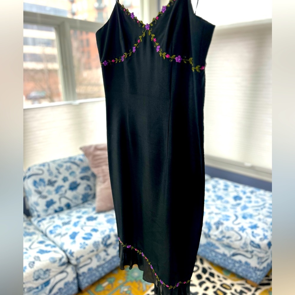 Gorgeous black spaghetti strap cocktail dress. Perfect for spring!